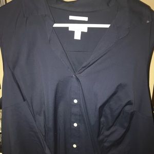 Sleeveless navy button up.